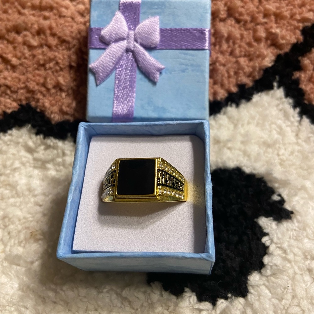 Gold and Black Ring with Gemstone this is a fashion ring, gold plated